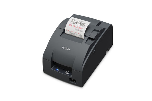 Epson TM-U220IIB impact dot matrix POS receipt printer with autocutter, dark grey (Epson Dark Grey), serial (C31CL27102) – left 3/4 view with receipt