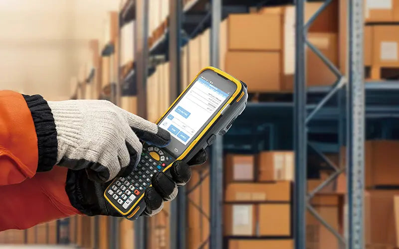 CipherLab RK96 Wi-Fi 7 industrial Android mobile computer, pistol grip, 53-key alphanumeric keypad, 2D imager (extended range, SE5800) (AK96N5F65XSG1) – alphanumeric keypad in use